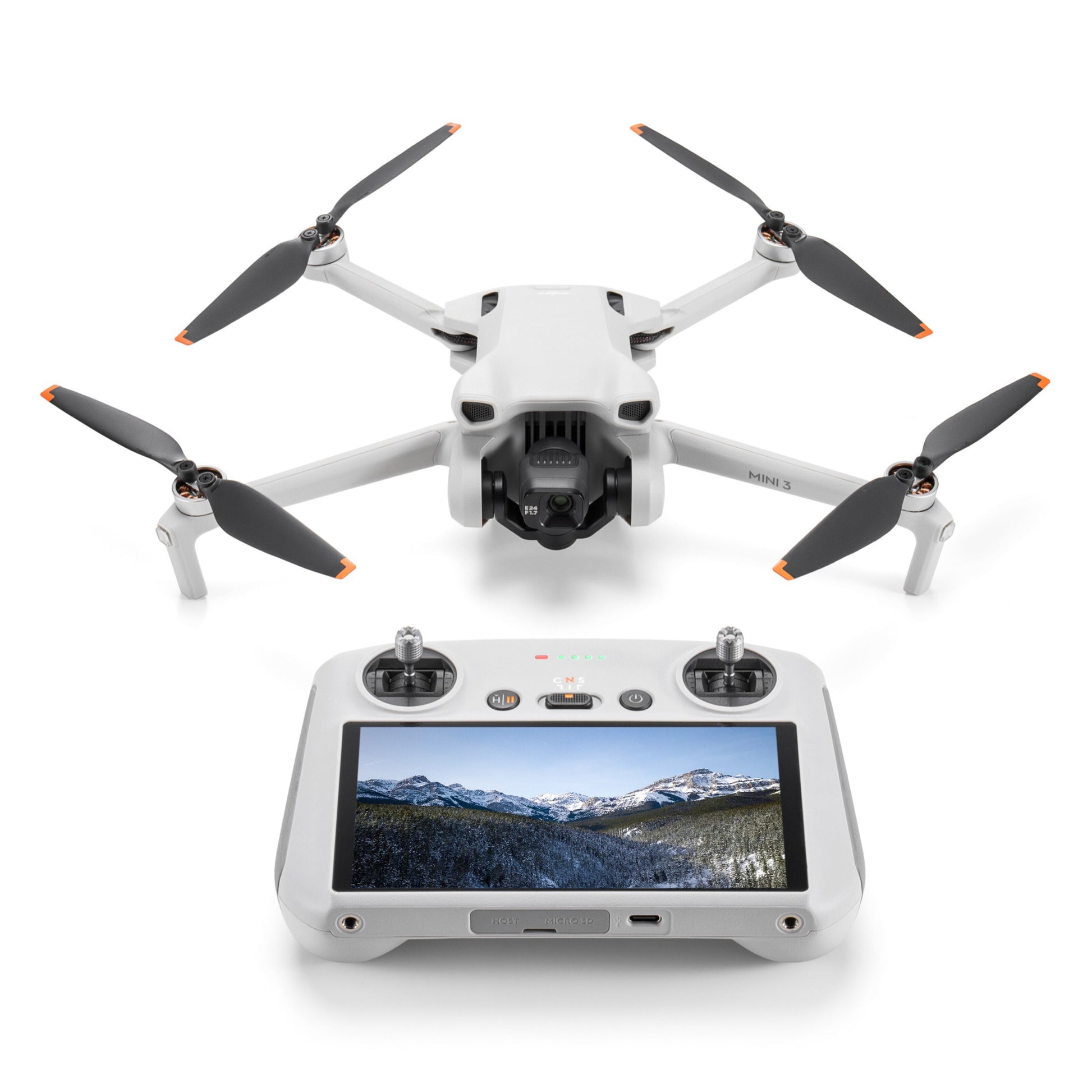 Dji Mini 3 drone hvid med fire propeller bag ved controller, viser bjergscene på skærm, optager i 4K.