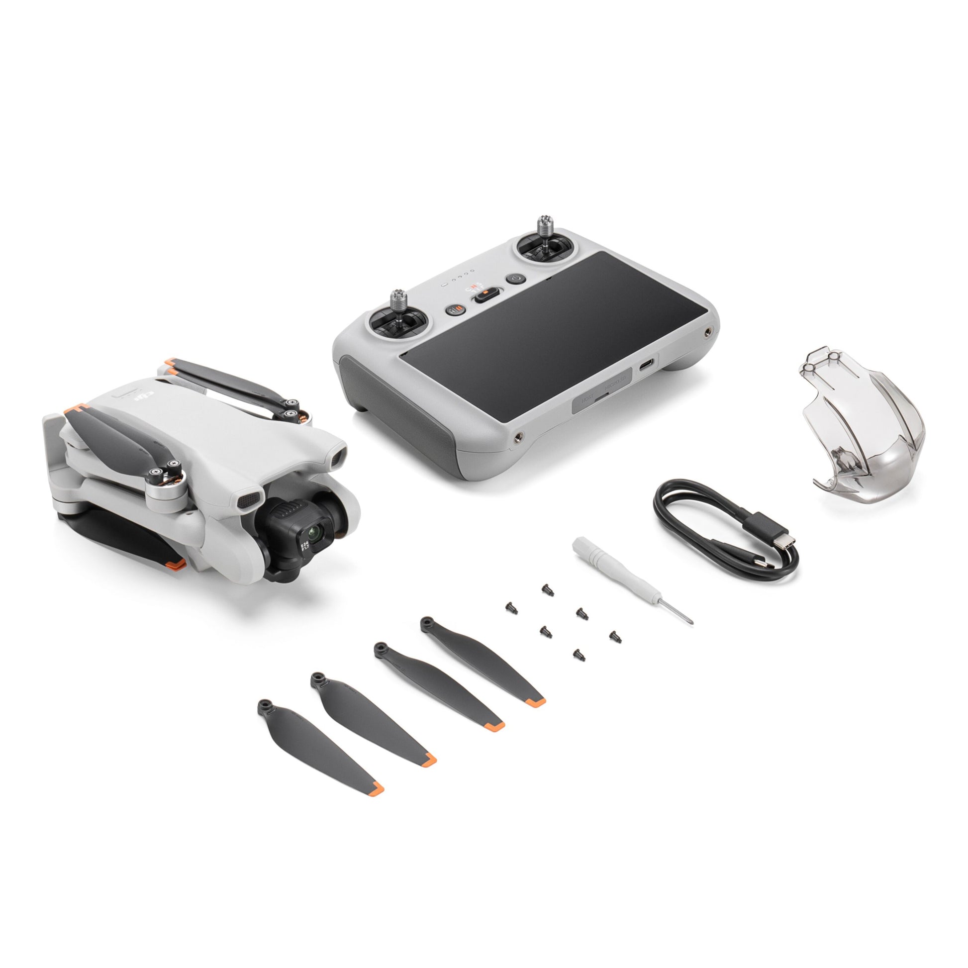 DJI Mini 3 foldet drone grå med fjernbetjening, 4 propeller, skruer, skruetrækker, beskyttelsescover og opladerkabel.