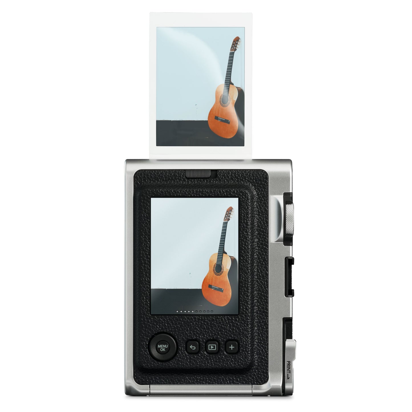 Fujifilm Instax Mini Evo sorterer printerfoto af klassisk guitar, motiv vises på kameraets display.
