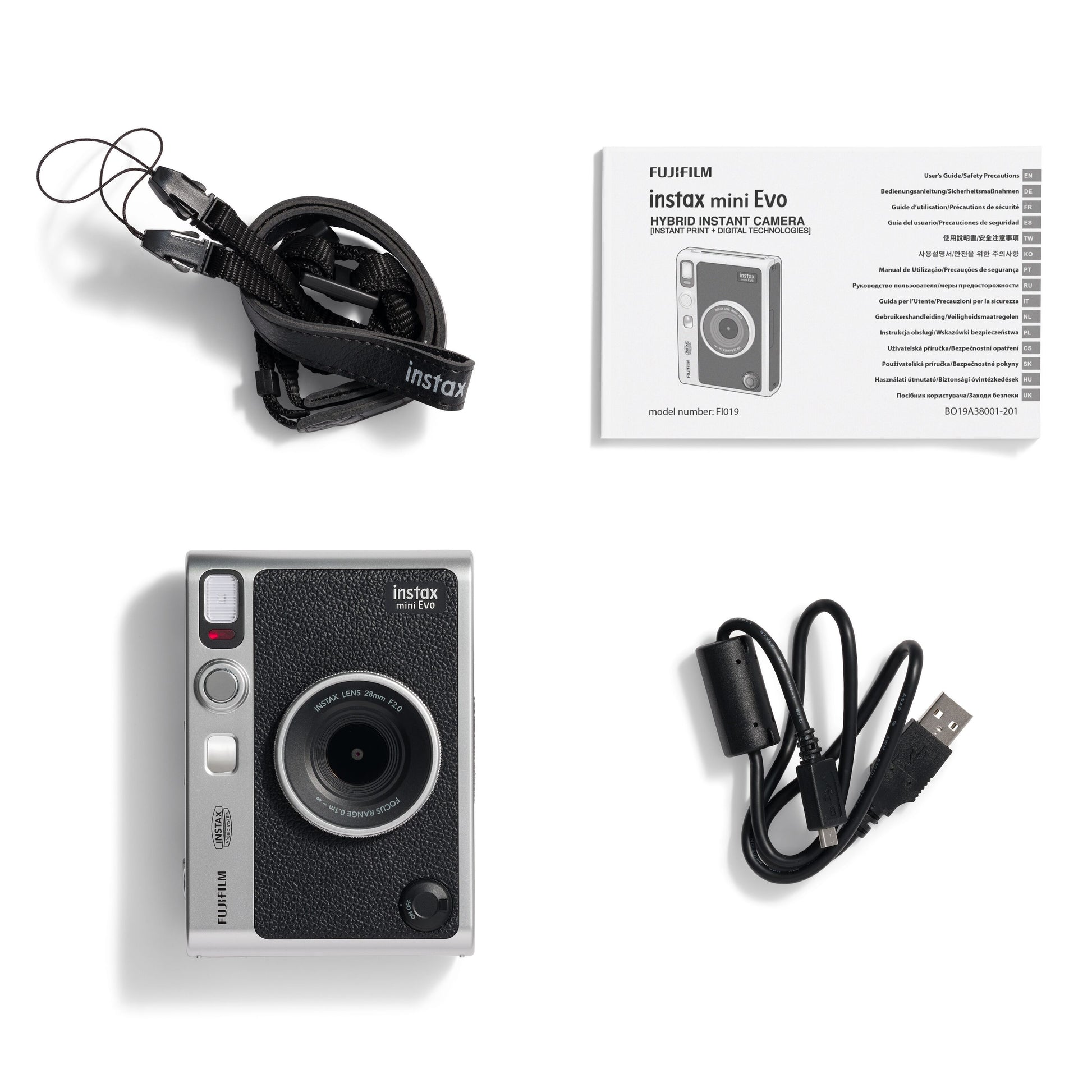 Fujifilm Instax Mini Evo Sort instantkamera med nakkestrop, brugervejledning og USB-opladerkabel i sort.