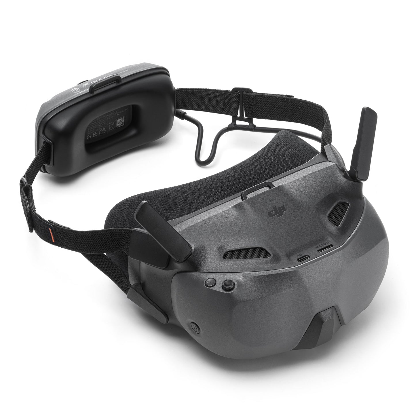 DJI Neo Motion Fly More Combo med FPV-briller mørkegrå, justerbar hovedrem, skumpude, antenne og batteripakke.