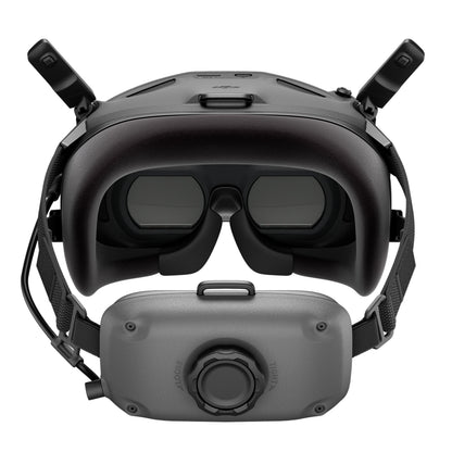 DJI Neo Motion Fly More Combo sort VR-headset med justerbare stropper, store dual-linser og eksterne antenner med tilhørende modul.