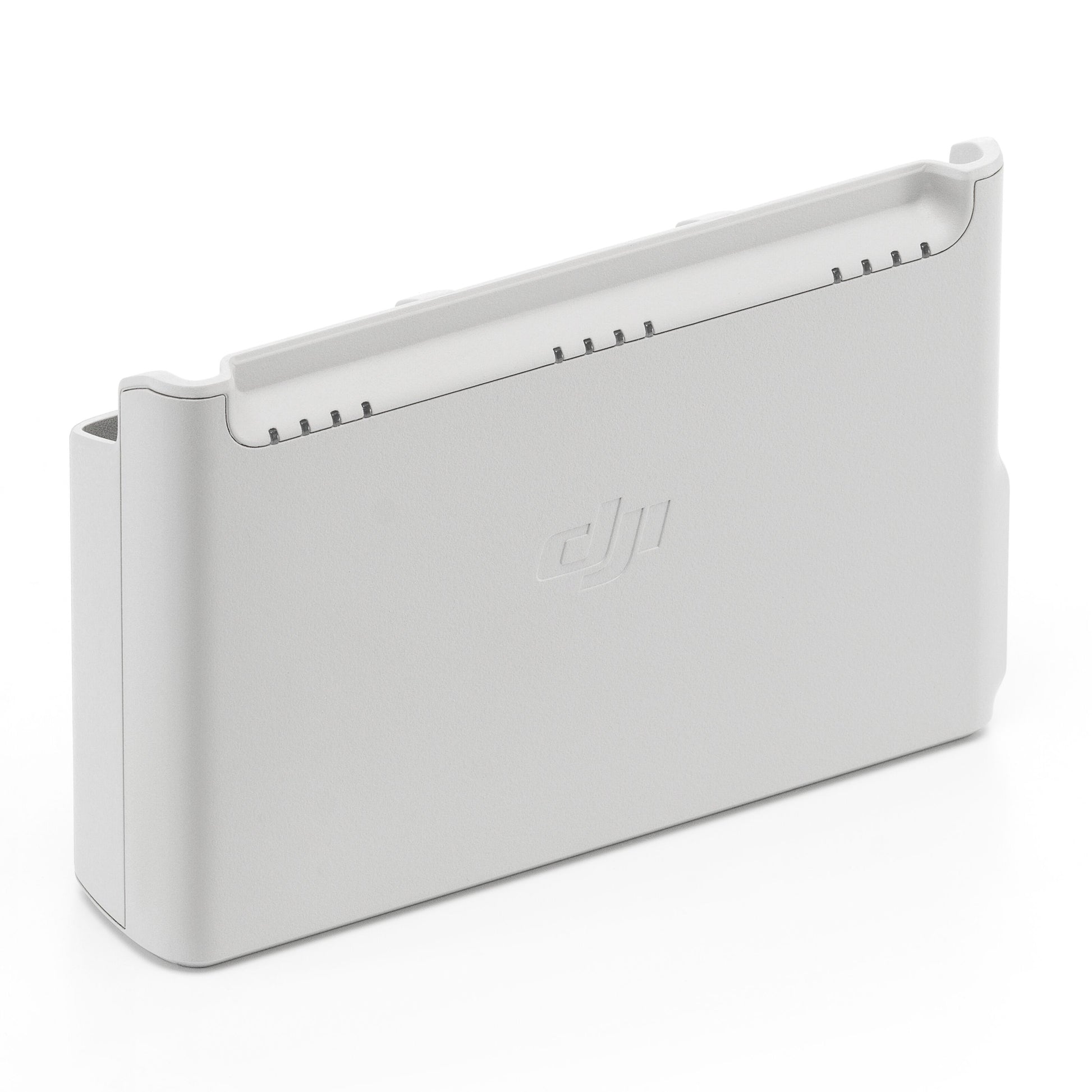 DJI Neo hvid opladningsstation til batterier, opretstående med afrundede kanter, DJI-logo foran, porte øverst.