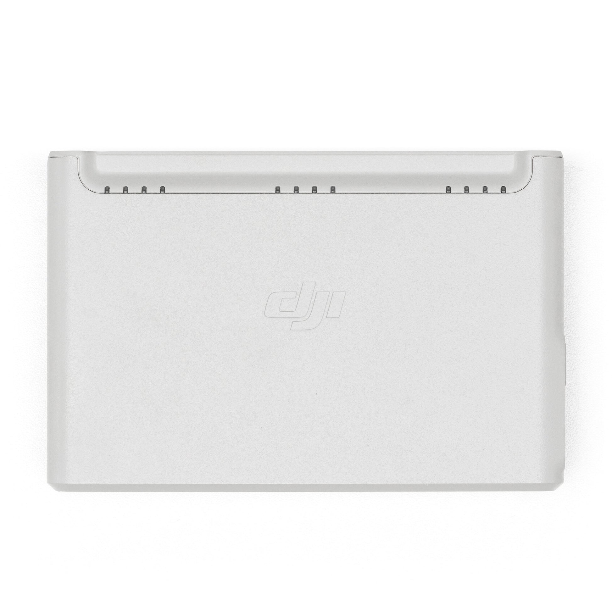 DJI Neo batteripakke, rektangulær, lys grå med afrundede kanter og centreret DJI-logo, set oppefra.