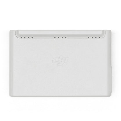 DJI Neo batteripakke, rektangulær, lys grå med afrundede kanter og centreret DJI-logo, set oppefra.