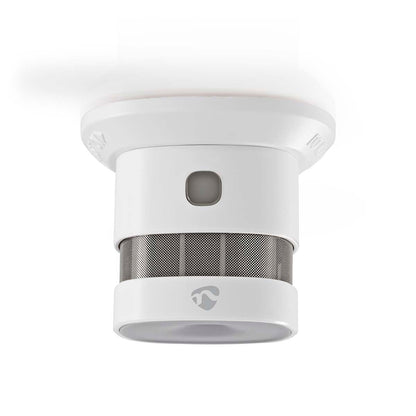 Nedis WiFi Brandalarm 5 år, hvid rund model til loft, central knap og metalnet, smart home kompatibel.