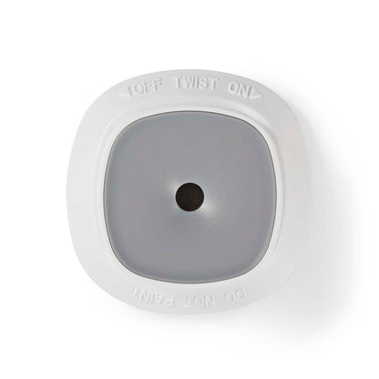 Nedis WiFi Brandalarm 5 år låg i hvid/grå plast med sort centerprik, hævet tekst OFF TWIST ON og DO NOT PAINT.