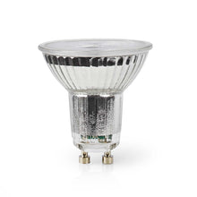 GU10 LED-spotpære med klart rillet glas, to metalben og synlig base.