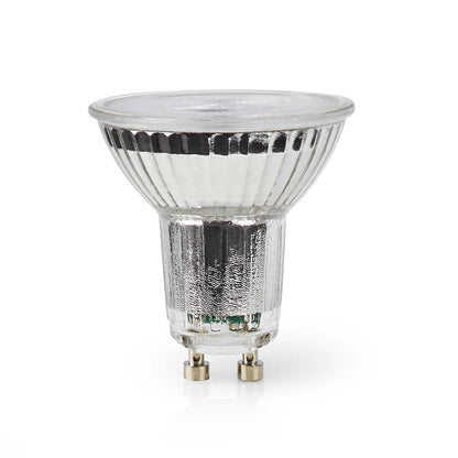 GU10 LED-spotpære med klart rillet glas, to metalben og synlig base.