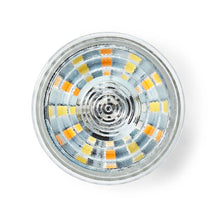 Top view GU10 LED pære wifi 345 lm, synlige gule og orange LED-chips i koncentriske ringe inde i klart glas.