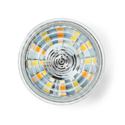 Top view GU10 LED pære wifi 345 lm, synlige gule og orange LED-chips i koncentriske ringe inde i klart glas.