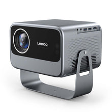 Lenco LCF LPJ-960SI Smart Wifi projektor, sølvgrå, cirkulær linse, sort front, sideventilation, USB og HDMI porte, buet metalstand.
