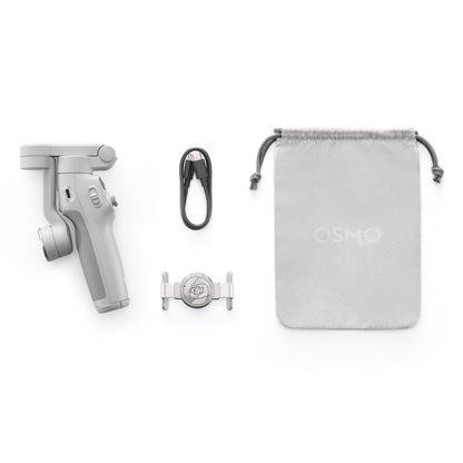 DJI Osmo Mobile 7 Gimbal grå med USB-kabel, smartphoneholder og lysgrå OSMO pose.