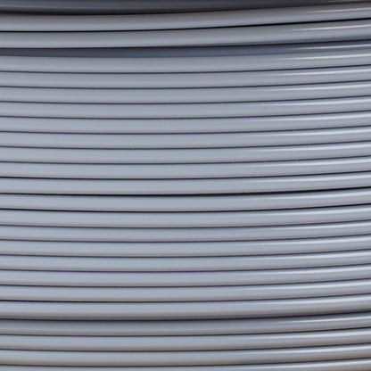 Copymaster3D PLA-filament 1,75 mm grå til 3D-printer stablet parallelt, synlige horisontale linjer.