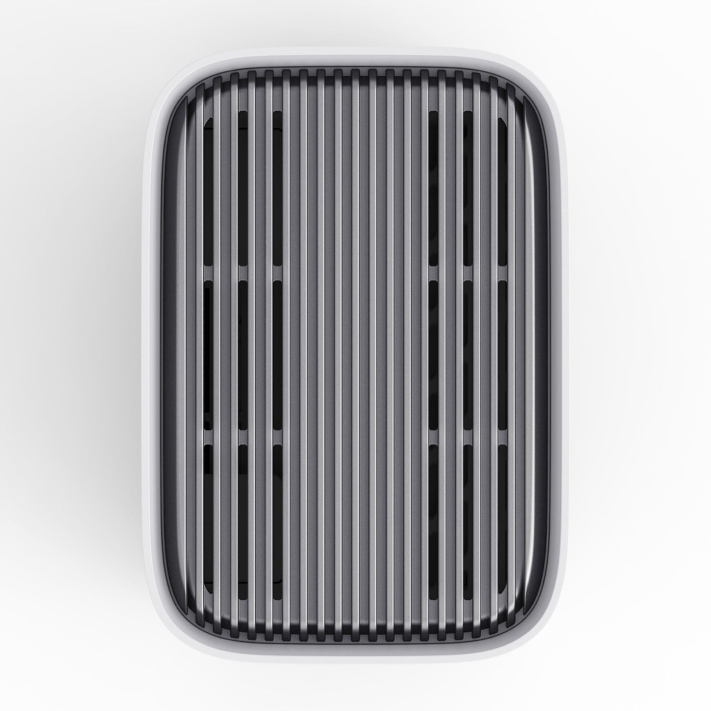 Luftrenser eller affugter med lodrette grillriller, set oppefra, vises sammen med EufyCam E40 3-kamera kit og HomeBase S380.