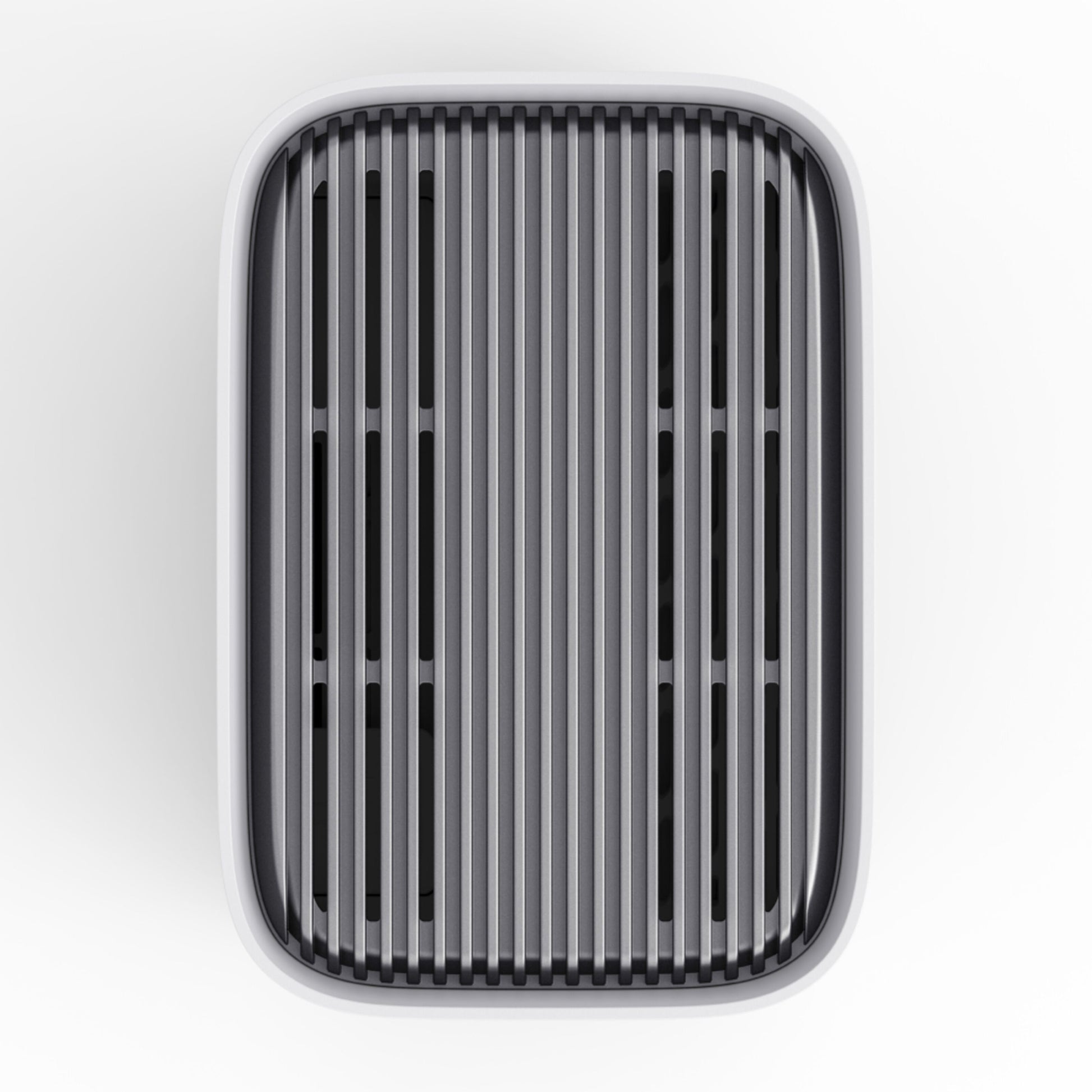 Luftrenser eller affugter med lodrette grillriller, set oppefra, vises sammen med EufyCam E40 3-kamera kit og HomeBase S380.