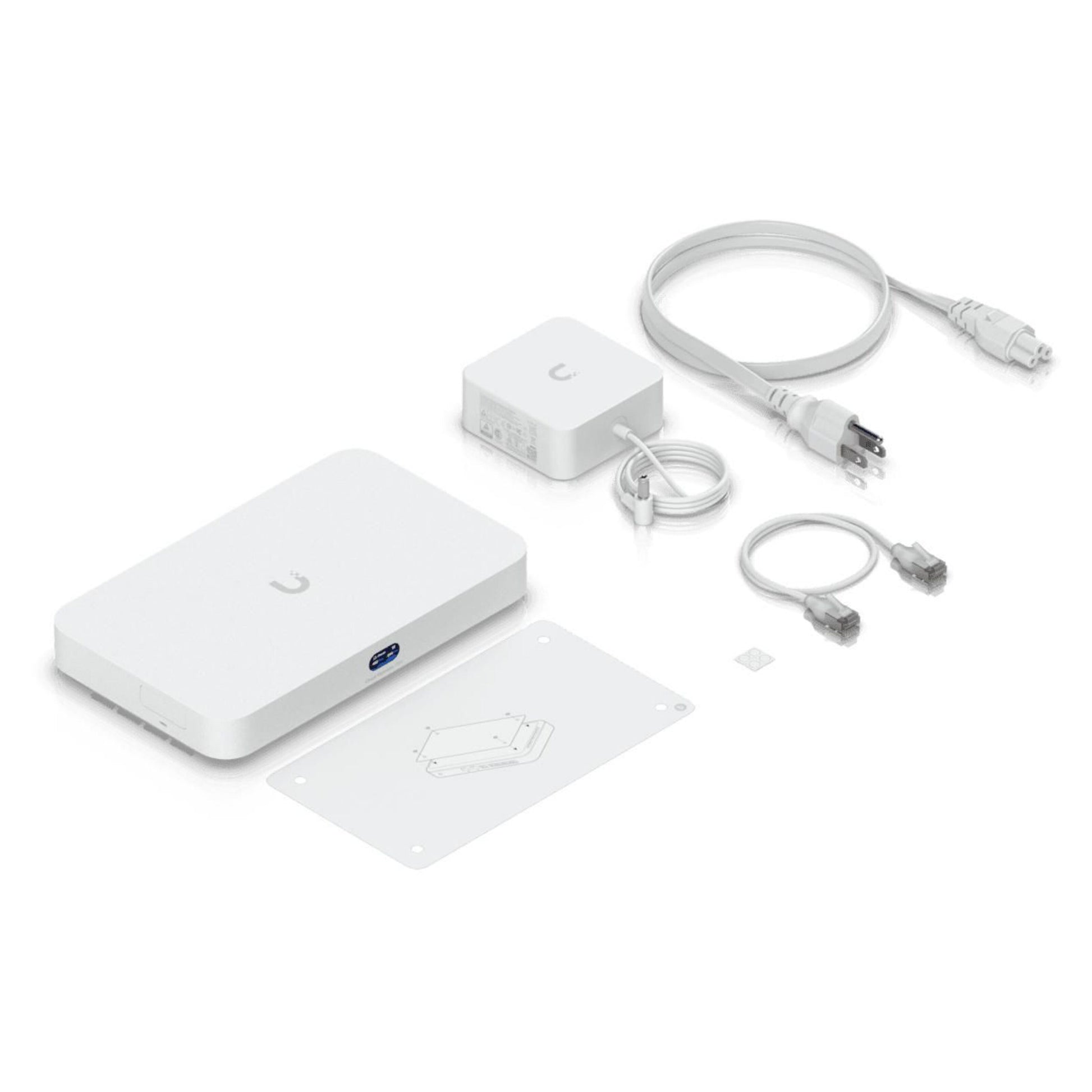 Ubiquiti Cloud Gateway Fiber kit med router, strømforsyning, 2 Ethernet-kabler, monteringsplade, SIM-kort, instruktionskort.