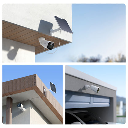 Reolink Argus Eco Ultra trådløs overvågningskamera monteret udendørs, til med små solpaneler, et over garage uden panel.