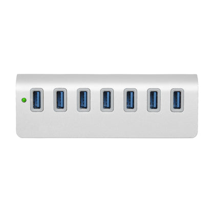 Plexgear Desktop 710 USB-hub sølv, 7 porte i række, grøn indikatorlys til venstre, 5 Gb/s.