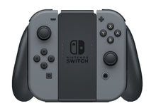 Nintendo Joy-Con Opladningsgreb til Switch med til aftagelige grå controllere, knapper, joysticks og centralt Switch-logo.
