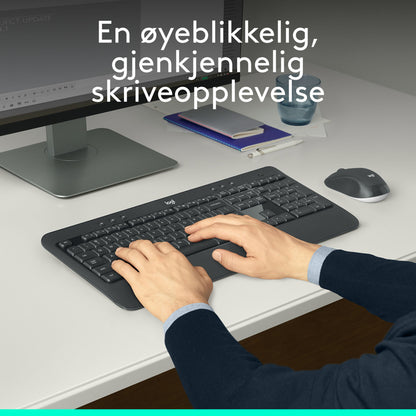 Logitech MK540 sorterer trådløst tastatur og mus med ergonomisk håndledsstøtte, norsk tekst på skærm.