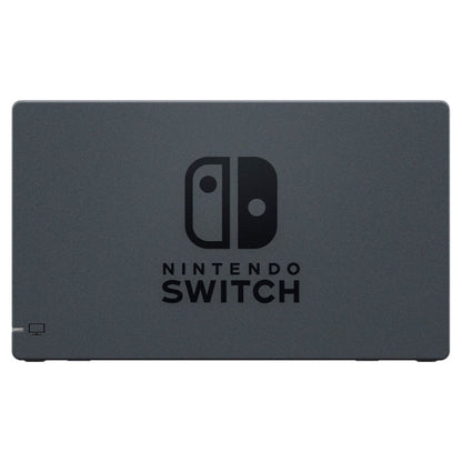 Nintendo Switch Dockingstation grå med sort Switch-logo i midten og HDMI-port til TV-tilslutning.