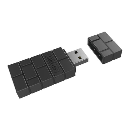 8Bitdo Trådløs USB-adapter 2 med hætte, kompatibel med Bluetooth-controllere og Nintendo Switch.