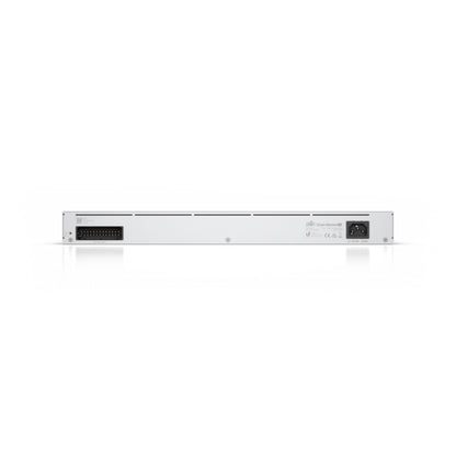 Ubiquiti Unifi Dream Machine Pro Controller og firewall i hvid, bagfra med flere porte, multi-pin stik til venstre, strøm til højre.