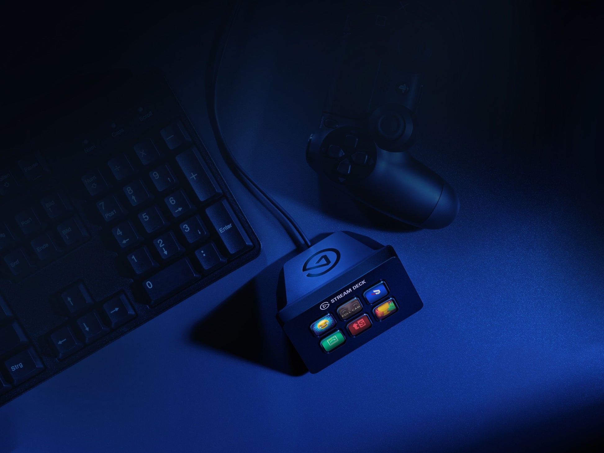 Elgato Stream Deck Mini programmerbart tastatur med oplyst LCD-taster, USB-taster og videospilcontroller i mørk opsætning.