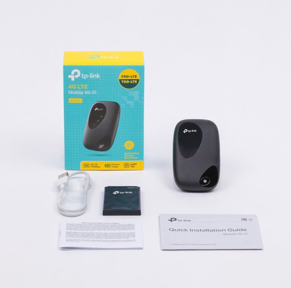 TP-Link M7200 4G router sort, synlig med batteri, USB-kabel, installationsvejledning og original emballage.