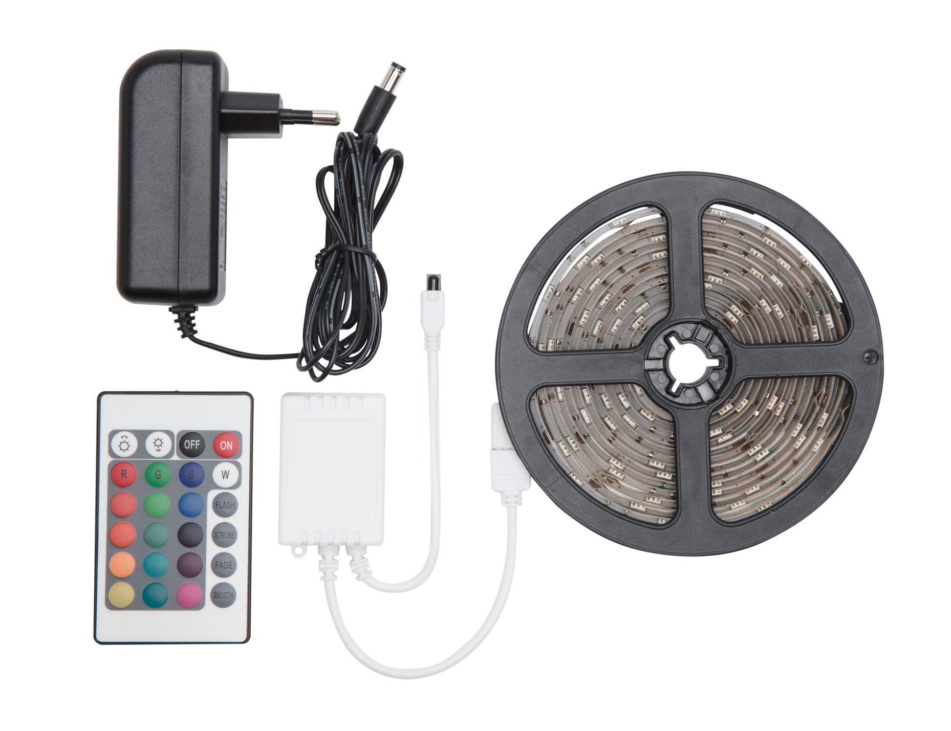 LED-strip RGB 5 m med sort strømforsyning, farverig fjernbetjening, hvid kontrolboks og rulle med coilet LED-bånd.