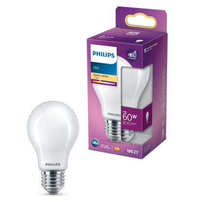 Philips LED pære E27 7W 806lm 2700K varmt hvidt lys ved siden af lilla/hvid æske med energispareikon.