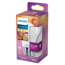 Philips dæmpbar LED-pære E27 1521 lm, varm hvid 2700K, 12W (100W), i emballage med stuebillede og detaljer.