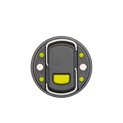 Ledsavers Mini-campinglampe grå rund med grøn central knap, fire små grønne cirkler og to hvide symmetriske elementer.