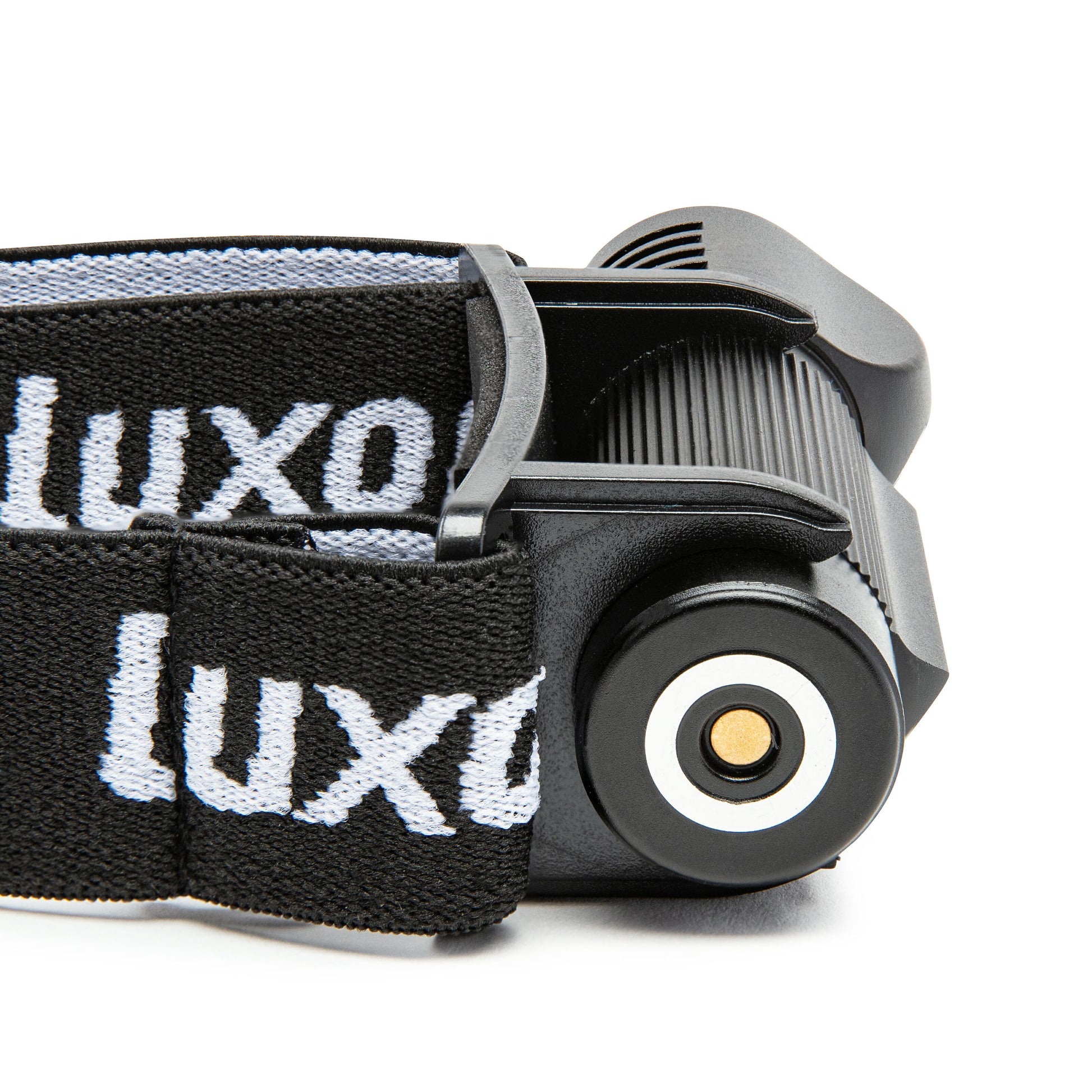 Luxorparts Multifunktionslampe 500 lm med rillet krop og rund linse, sort justerbar rem med hvidt Luxorparts-logo.