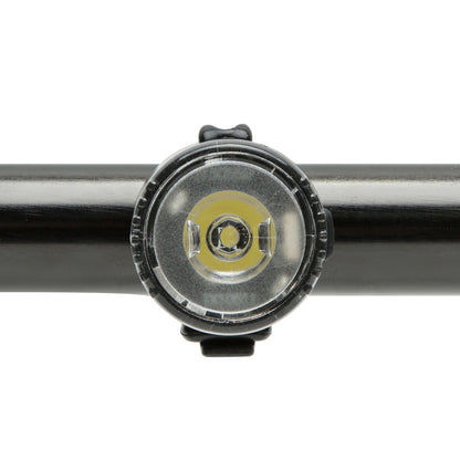 Ledsavers Cykellygter rund forlygte monteret på sort cykelstyr set forfra.