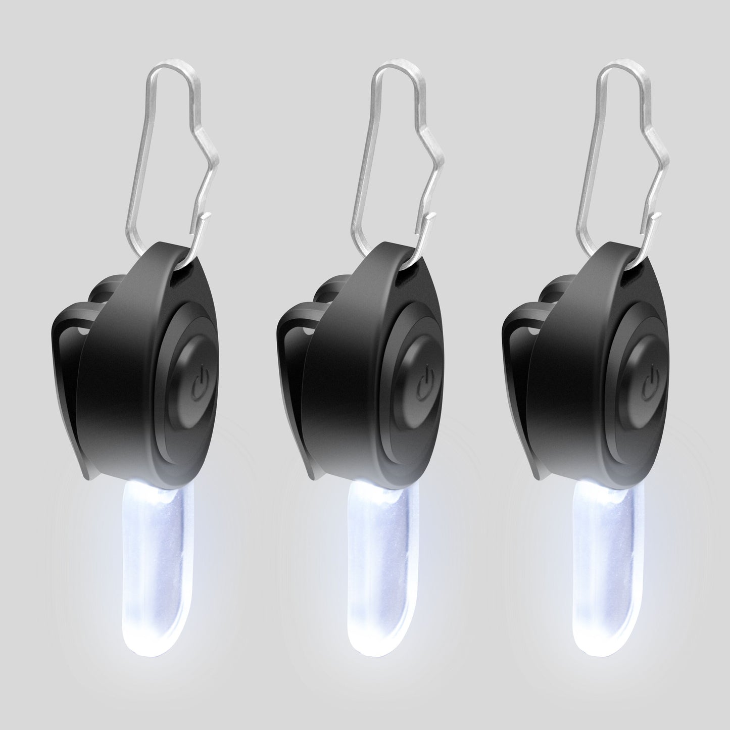Luxorparts LED-minilampe 3-pak, hvidt lys, power-knap, metal karabinhage, stående visning.