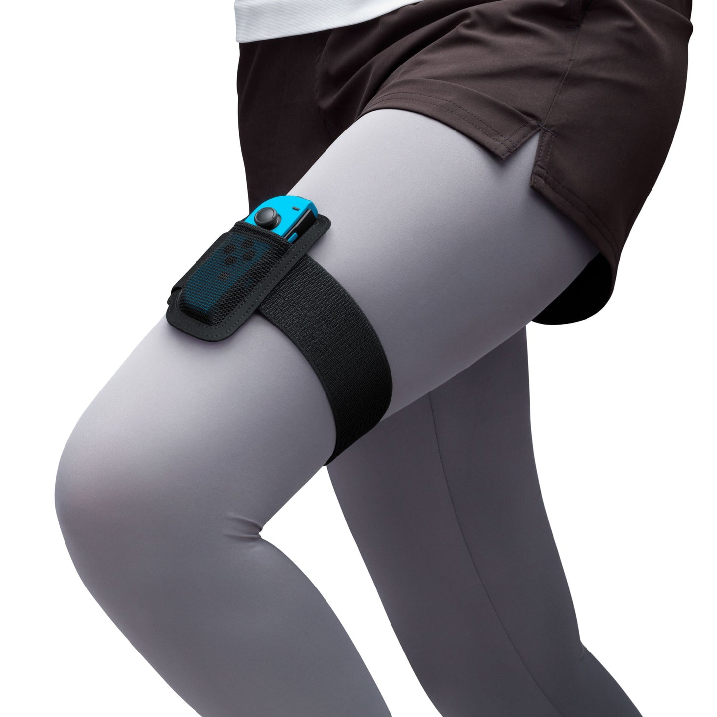 Nintendo Benrem til Joy-Con 1-pakke, blå holder fastgjort om over lår, bæres af person med grå leggings og mørke shorts.