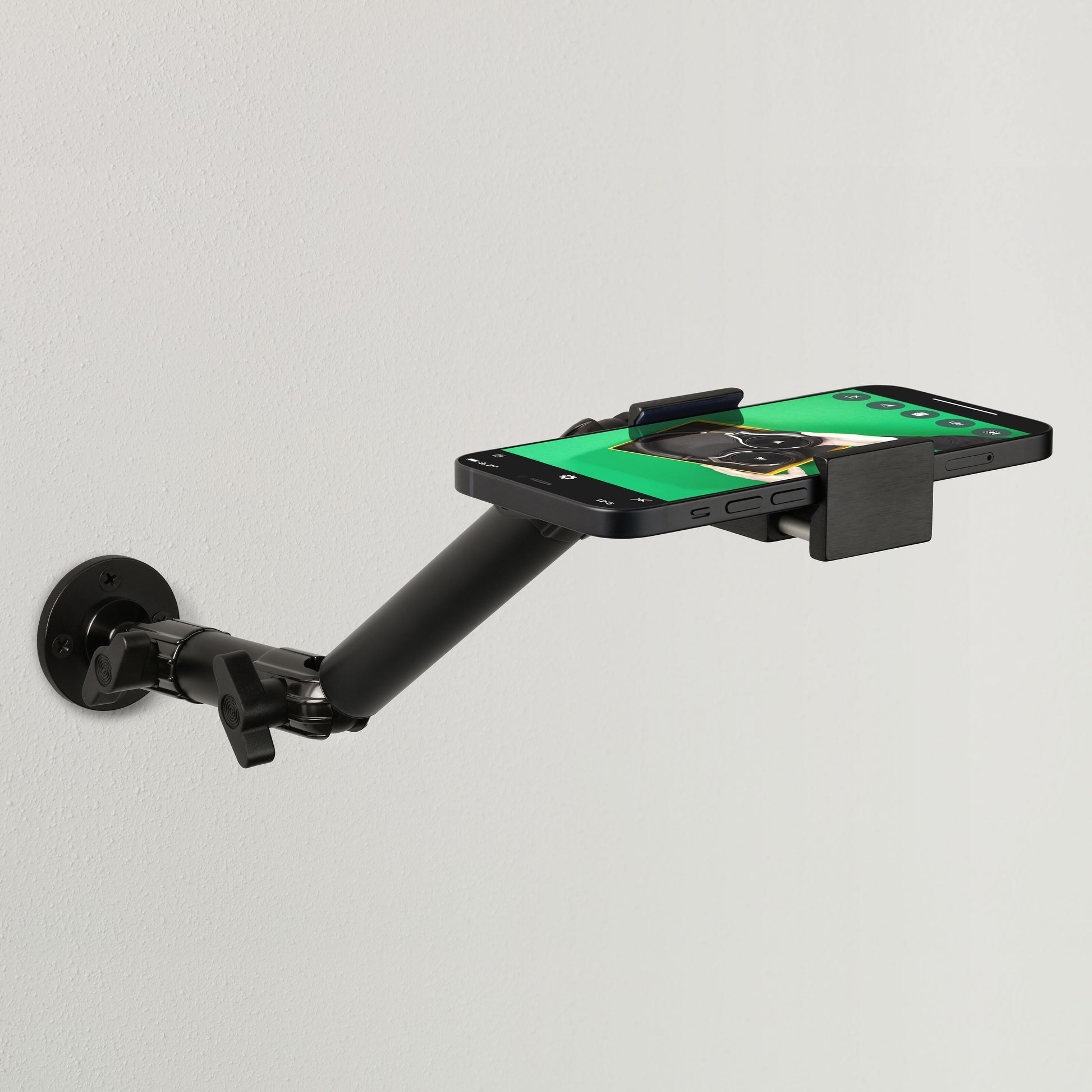 Elgato Vægbeslag justerbar sort vægmonteret arm med klemmeholder til smartphone i vandret position.