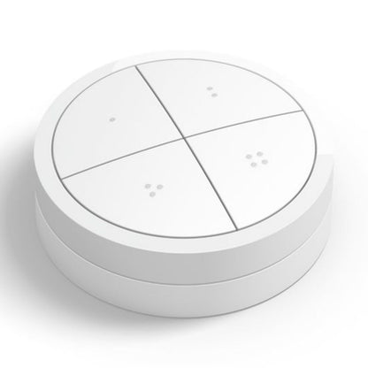 Philips Hue Tryk på Drejeknap fjernbetjening, hvid, rund med fire touch-knapper hver markeret med lille pris.