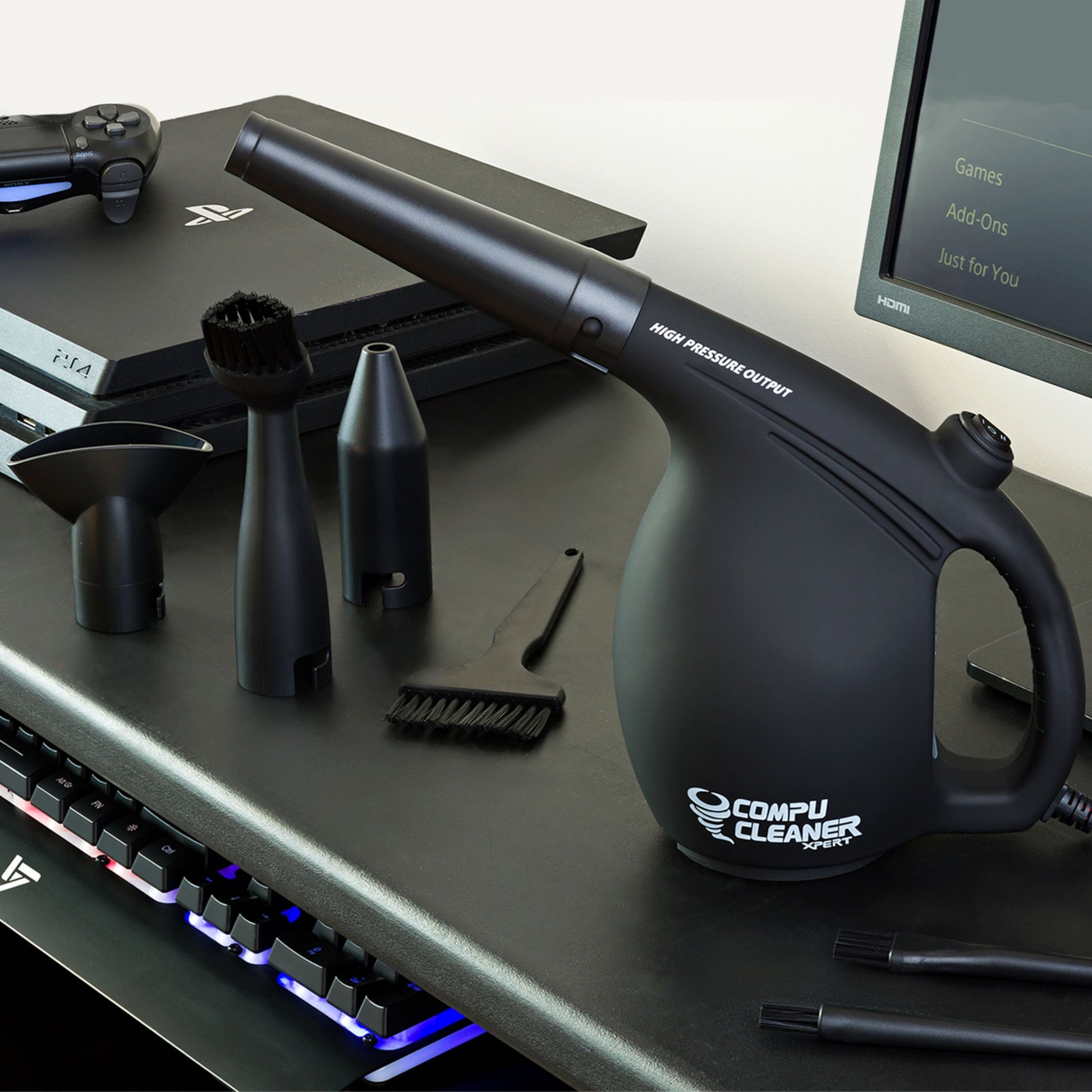 Sort IT Dusters CompuCleaner Xpert luftrensere med flere dyser, synlig ved tastatur, PlayStation og ESD mikrorensningsbørster.
