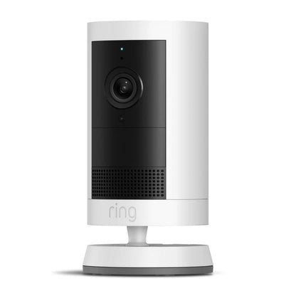 Ring Outdoor Cam Plus Plug-in hvid 2K overvågningskamera, hvid cylinder med sort front, kamera, mikrofon og højttalergrill.