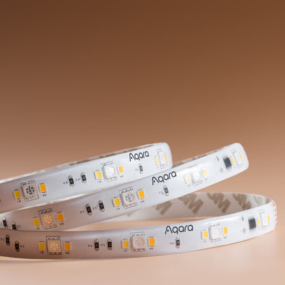 Aqara LED-strips T1 forlængelse 1 m, oprullet med små LED-dioder og synlige elektroniske komponenter.