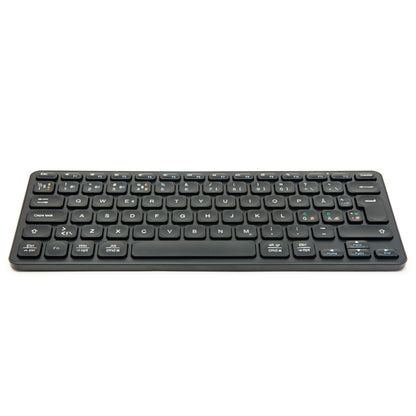Linocell Bluetooth-tastatur kompakt sort med lavprofiltaster og nordisk layout, fotograferet fra let vinkel.