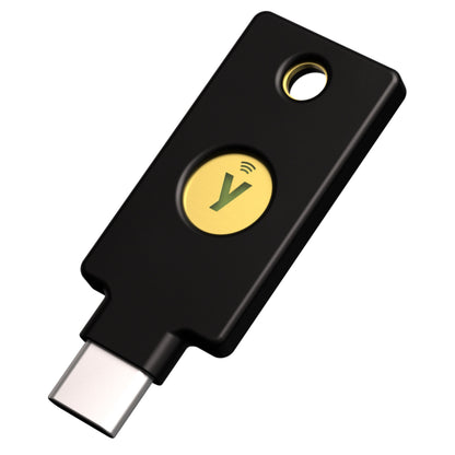 Yubico Sikkerhedsnøgle NFC USB-C sort, guld knap med grøn Y og wifi symbol, hardwarebaseret autentificering.