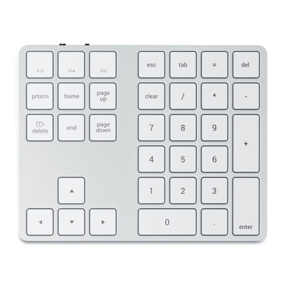 Satechi Trådløs Numpad Sølv med numeriske taster, piletaster, funktionsknapper, Esc, Tab, Delete og Bluetooth.