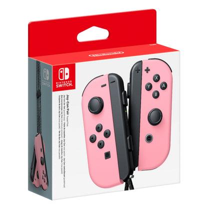 Nintendo Joy-Con par håndkontroller lyserød, venstre og højre ses på hvid/rød æske med Nintendo Switch-logo.