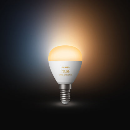 Philips Hue Luster Kuglelampe White Ambiance E14 470 lm med justerbar farvetemperatur, synlig i blå til orange gradient.