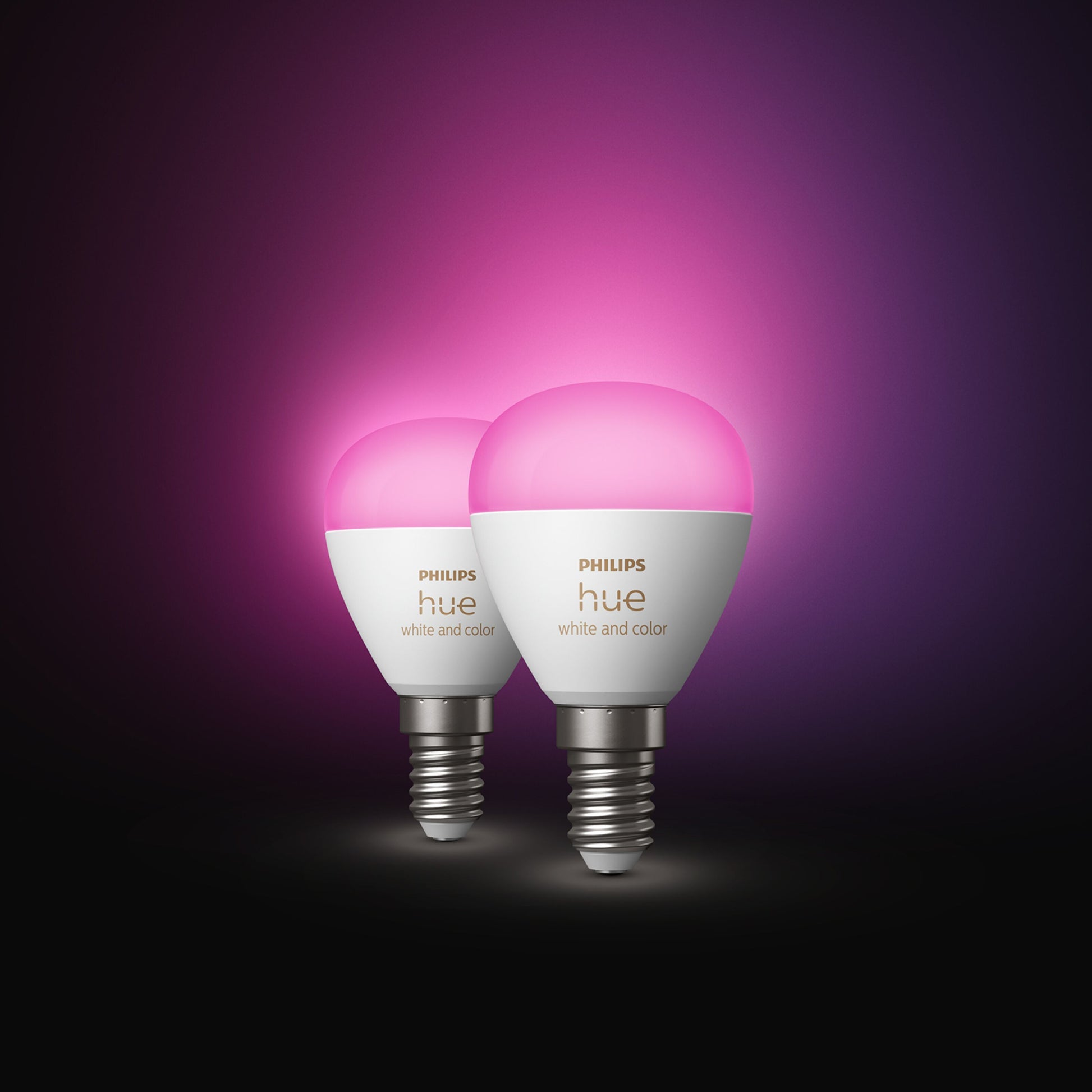 Philips Hue Luster Kuglelampe White and Color Ambiance E14 470 lm 2-pak lyser pink med synlige lyskilder.