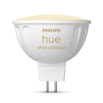 Philips Hue White Ambiance MR16 400 lm smart LED-pære med GU5.3 sokkel og guldtryk af Philips Hue-logo og navn.